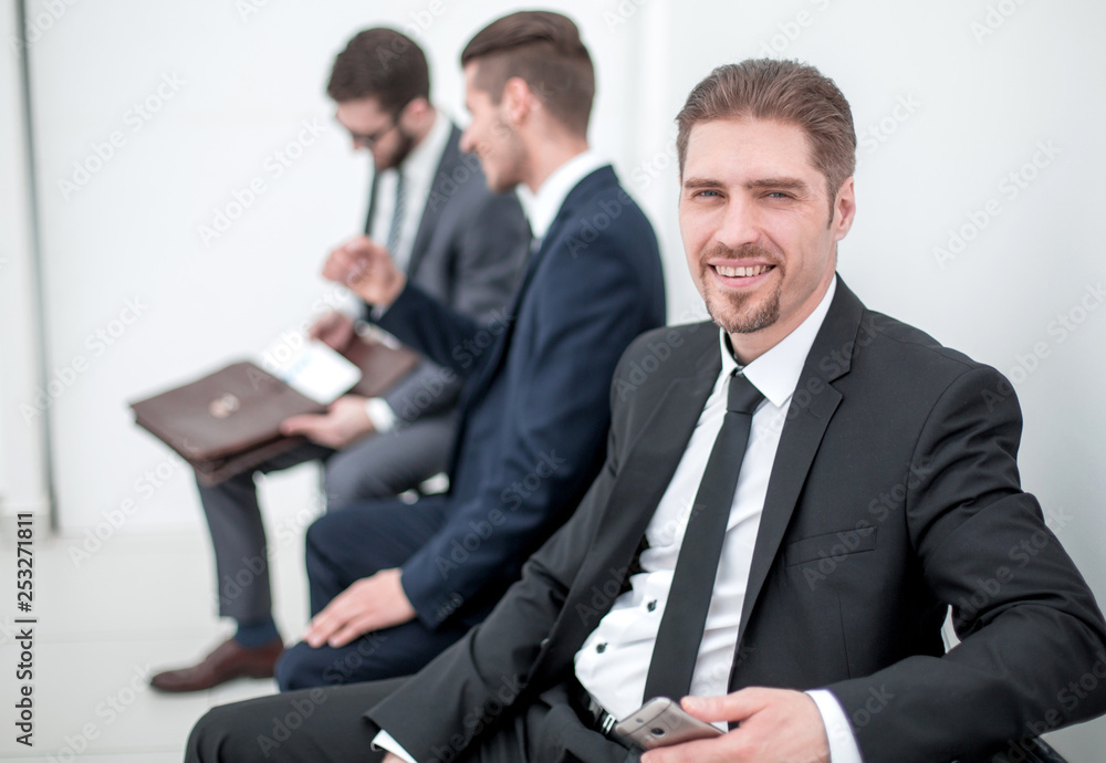 confident businessman waiting for a meeting confident businessman waiting for a meeting