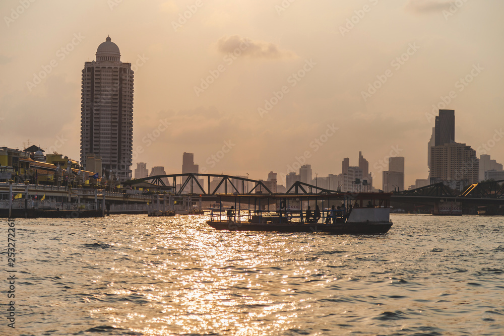 Landscape picture view with ferry crossing on the Chao Phraya river at the morning