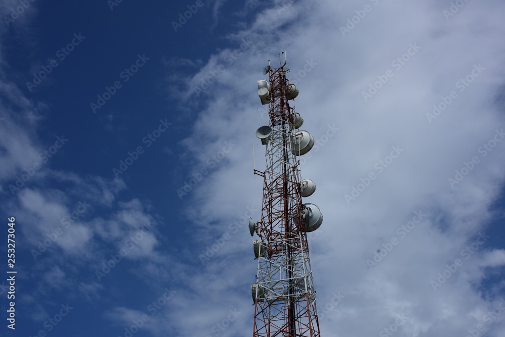 High pole for signal transmission. There are both wireless phone systems and microwave systems. Microwave system.Wireless Communication Antenna With bright sky. High pole for signal transmission. There are both wireless phone systems and microwave systems. Microwave system.Wireless Communication Antenna With bright sky.