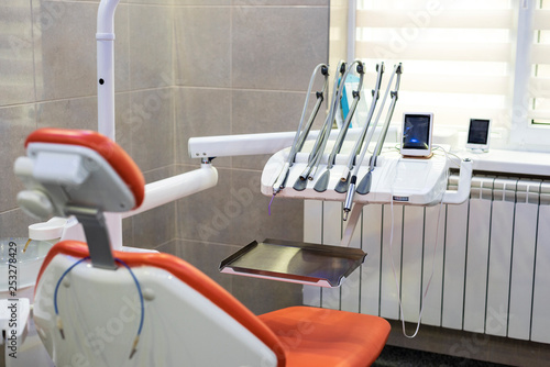Dentistry tools in a bright lit cabinet