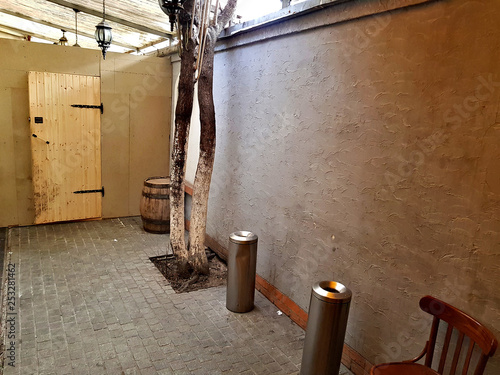 Cozy outdoor smoking room in the bar in a minimalist style © ironstuffy