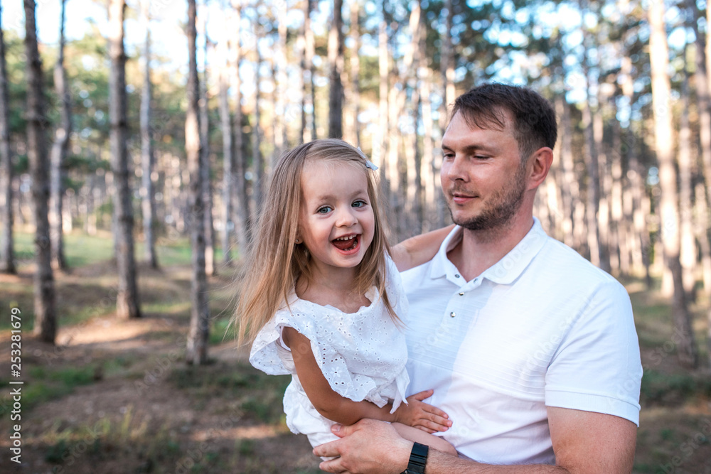Fototapeta premium Happy father and daughter having fun outdoors.