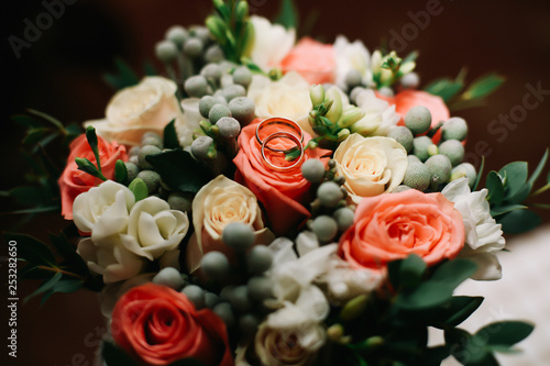 Wedding flowers. Wedding bouquet and wedding rings. Wedding details