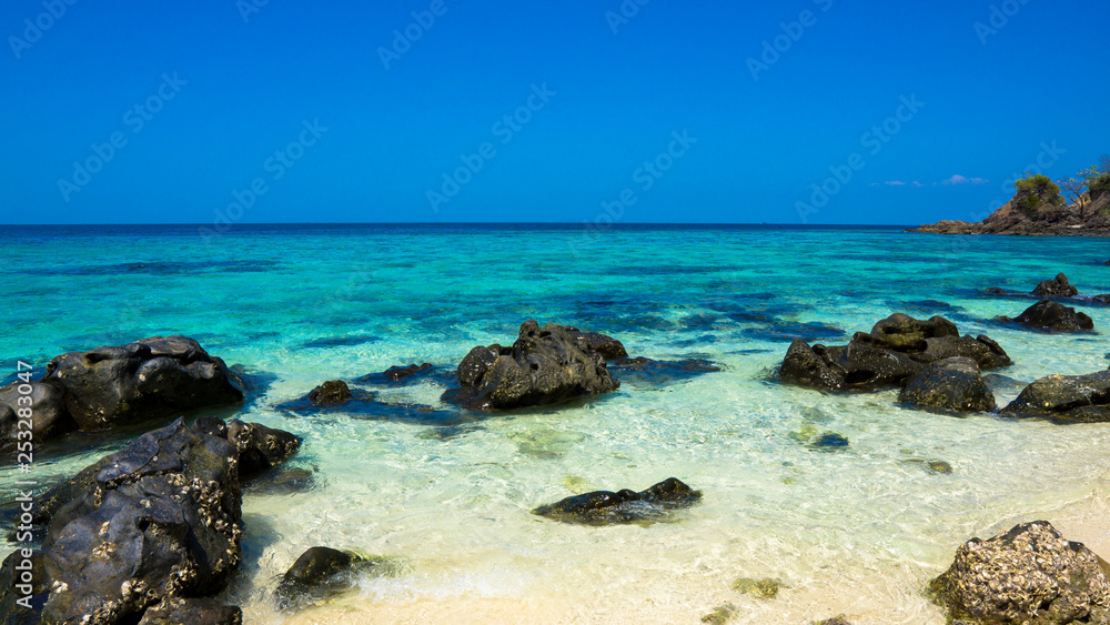 stone beach, blue sky and sea stone beach, blue sky and sea