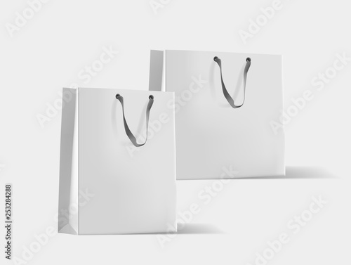 Creative mockup. Shopping bag. Mock-up of blank package, mockup of white paper shopping bag with handles.