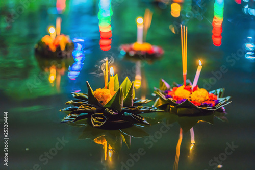 Photography Loy Krathong festival, People buy flowers and candle to light and float on water
