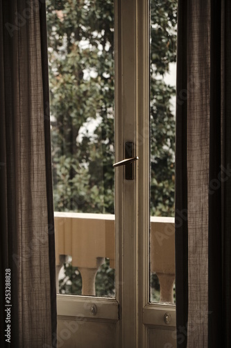 interior view of classic old windows door and balcony detail - solitude phobia mental problem agoraphobia.