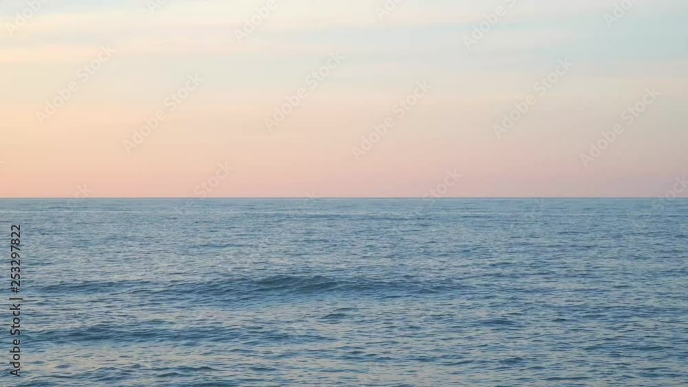 Horizon line over the sea at sunset time Horizon line over the sea at sunset time