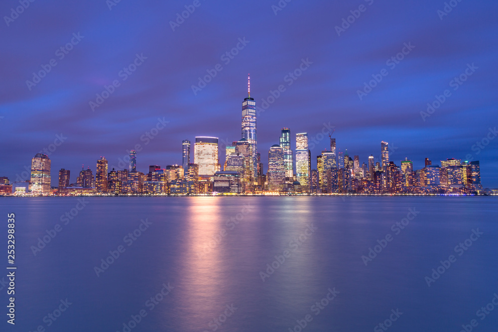Financial district from hudson river at twilight with long exposure