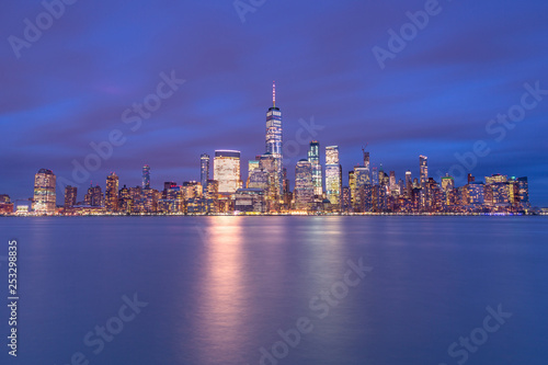 Financial district from hudson river at twilight with long exposure