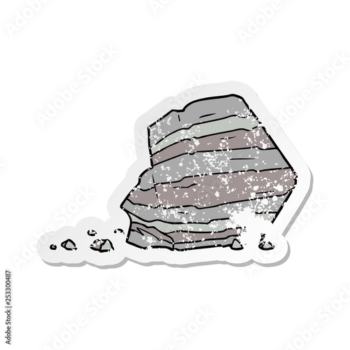 distressed sticker of a cartoon large rock