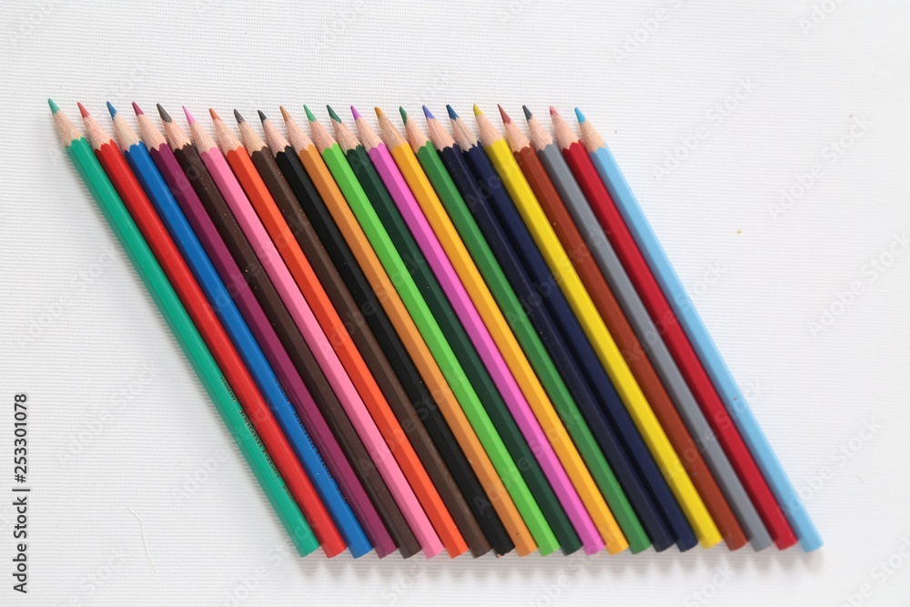 Colour pencils isolated on white background close up 