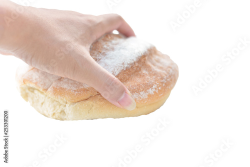 Bread in hand on white background.