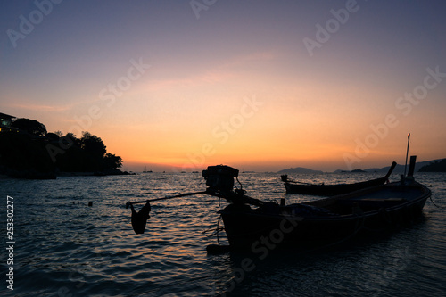 silhouette of a boat at sunset  summer beach landscape