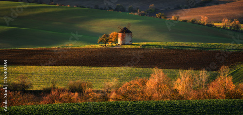 Rural landscape with an old mill, hills of South Moravia.