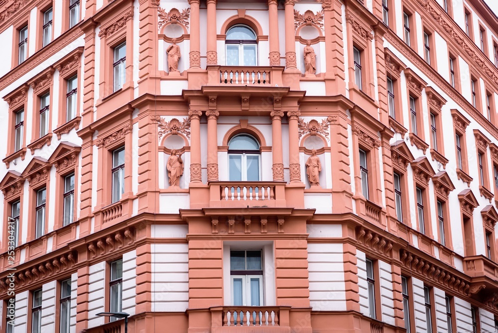 Beautiful facade of the old house. Fragment, details. Prague, Czech Republic.
