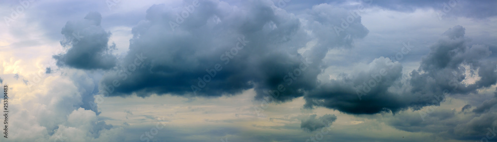 Gray rainy sky with big clouds. Nature background. Gray rainy sky with big clouds. Nature background.