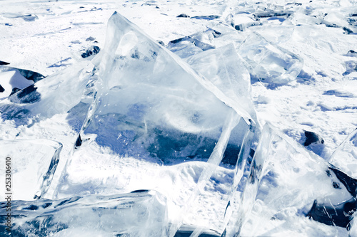 Blocks of ice gleaming in the sun. Arctic winter background.