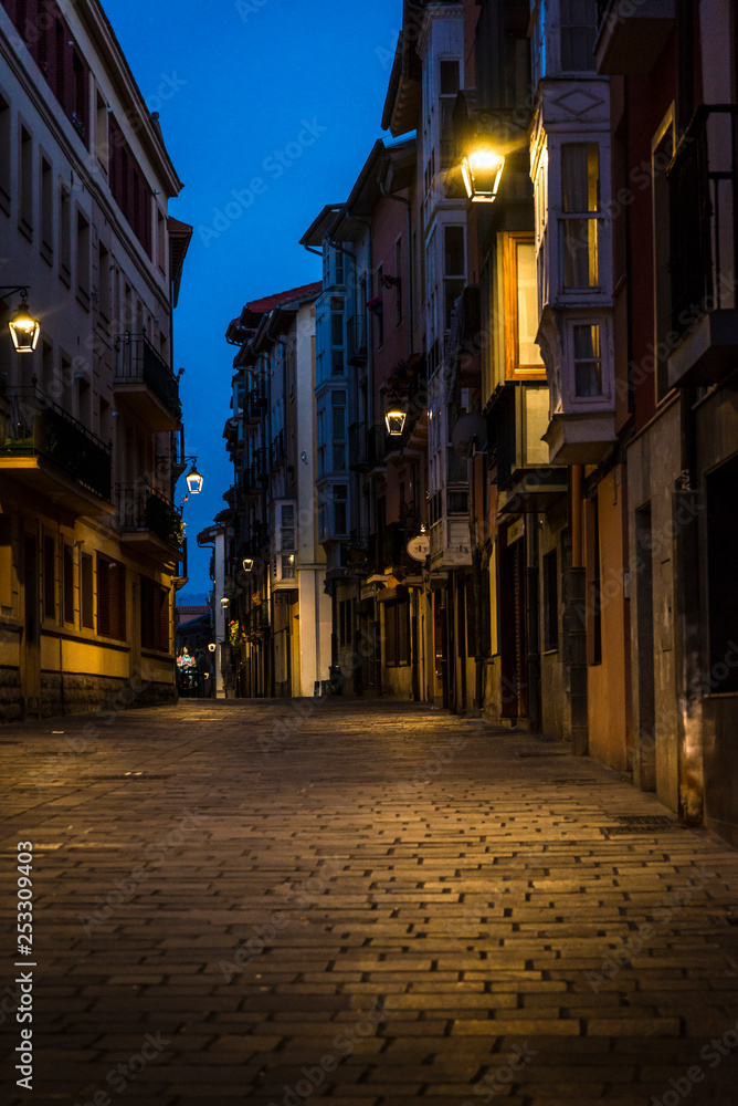 Atmospheric medieval street Calle Correría in the Old City, Vitoria-Gasteiz, Basque Country, Spain