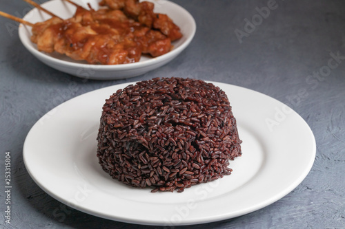 close up of steamed riceberry rice on plate