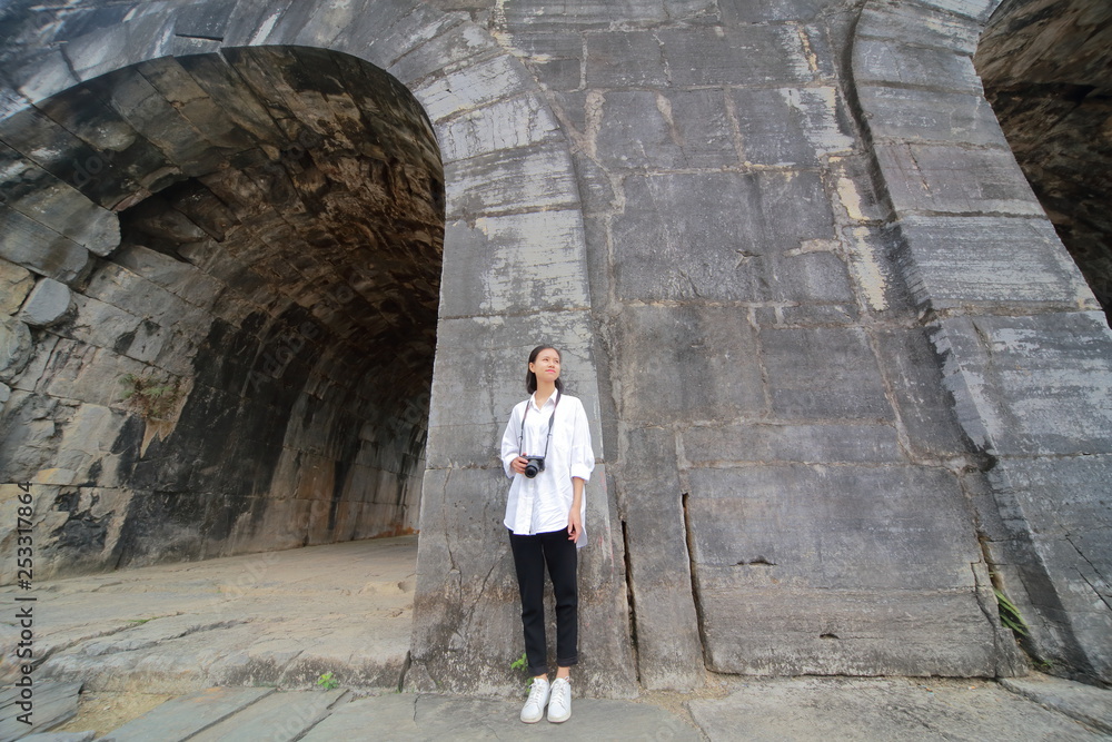 woman traveling to Ho citadel in Thanh Hoa,Vietnam