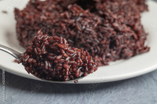close up of steamed riceberry rice on plate