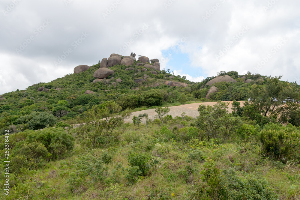 Rocky landscape in Pedra Grande Park in Atibaia, Sao Paulo, Brazil. On the top of the mountain there is a rock split in two struck by a lighting