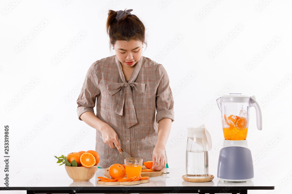 girl is learning to make fruit juicc girl is learning to make fruit juicc