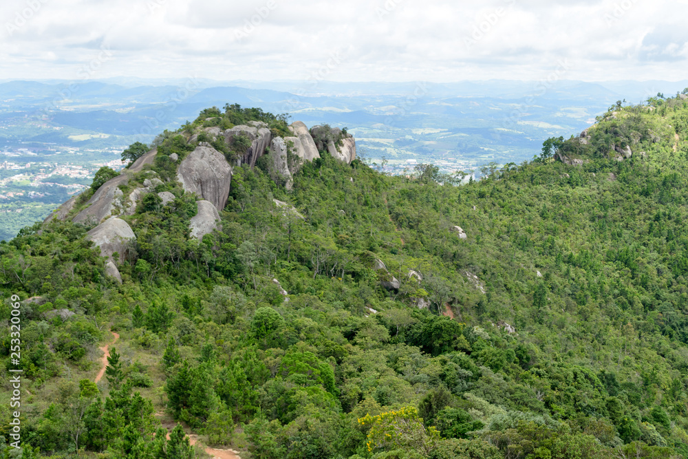 Amazing green landscape seen from Pedra Grande, a stone hill in Atibaia, Sao Paulo in Brazil. This kind of vegetation is called Atlantic forest