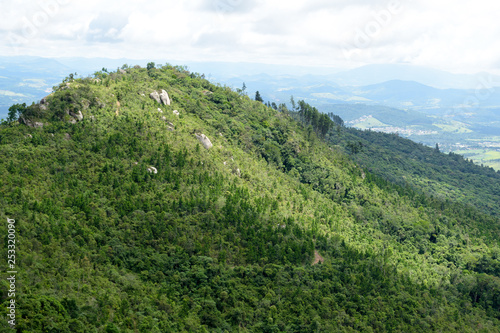 Amazing green landscape seen from Pedra Grande, a stone hill in Atibaia, Sao Paulo in Brazil. This kind of vegetation is called Atlantic forest