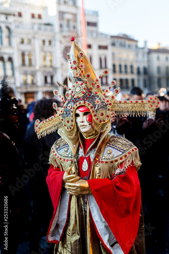 Beautiful Venetian masked model from the Venice Carnival 2019