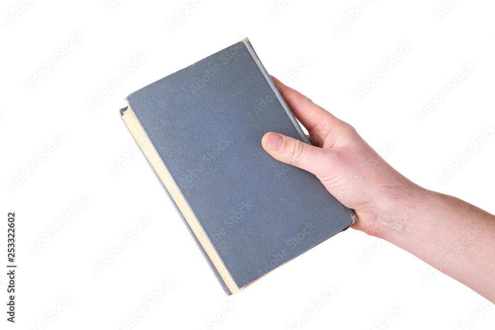 Man hand holding grey old book on white background Man hand holding grey old book on white background