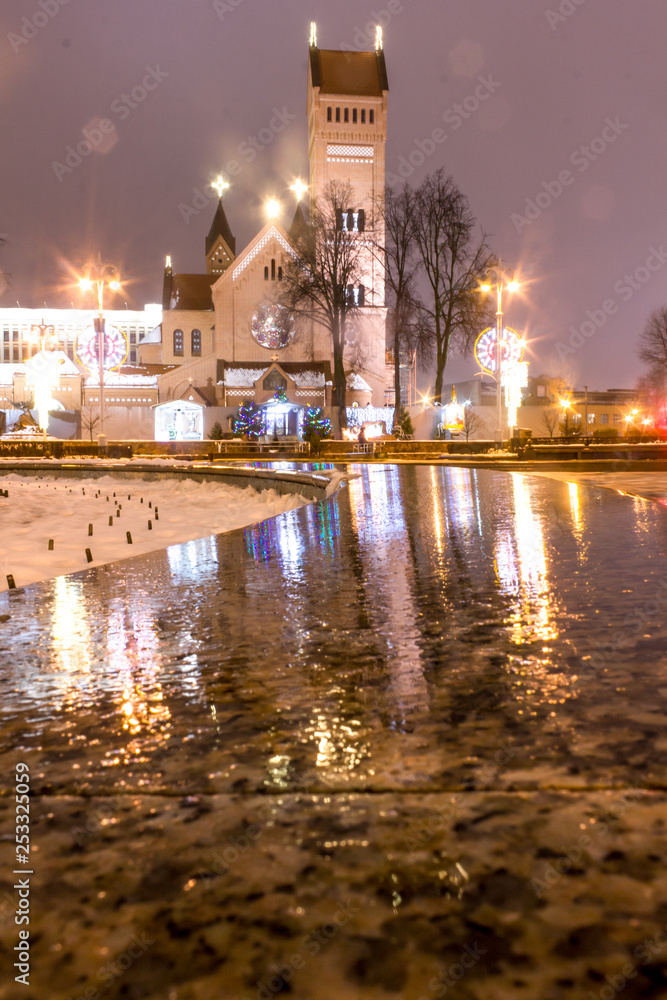 Belarus, Minsk, December 28, 2018: Catholic church of St. Simeon and St. Helena. Photo taken at night.
