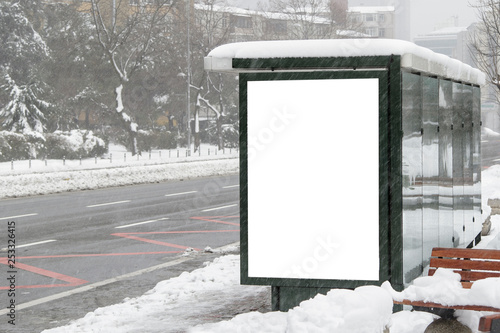 Billboard on street in winter