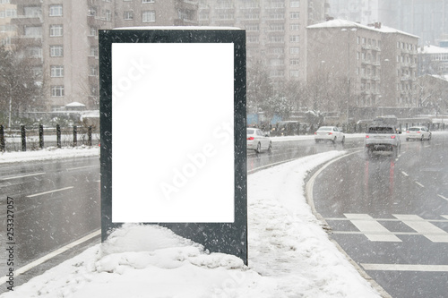 Billboard on street in winter