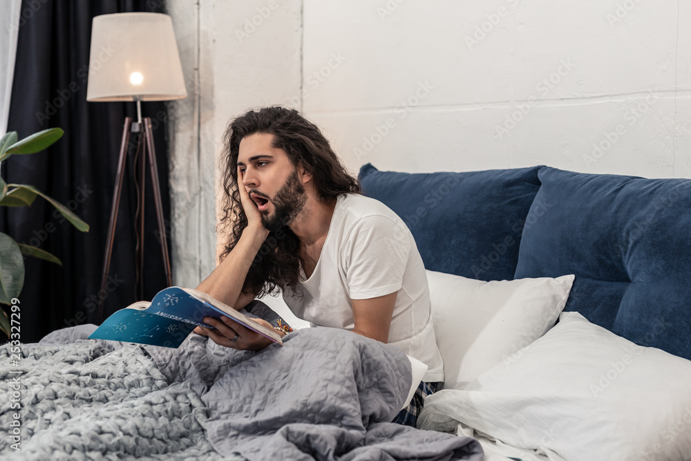Nice good looking man thinking about sleeping Nice good looking man thinking about sleeping