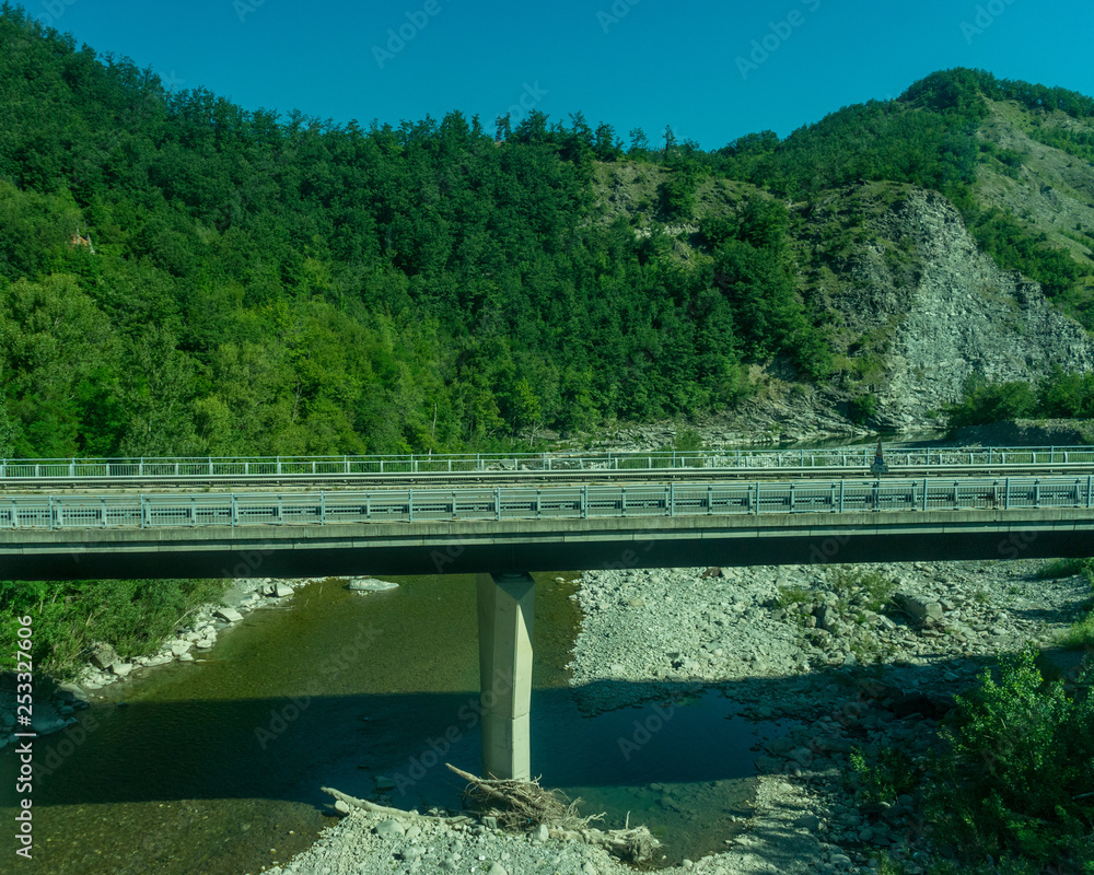 Italy,La Spezia to Kasltelruth train, a bridge over a body of water