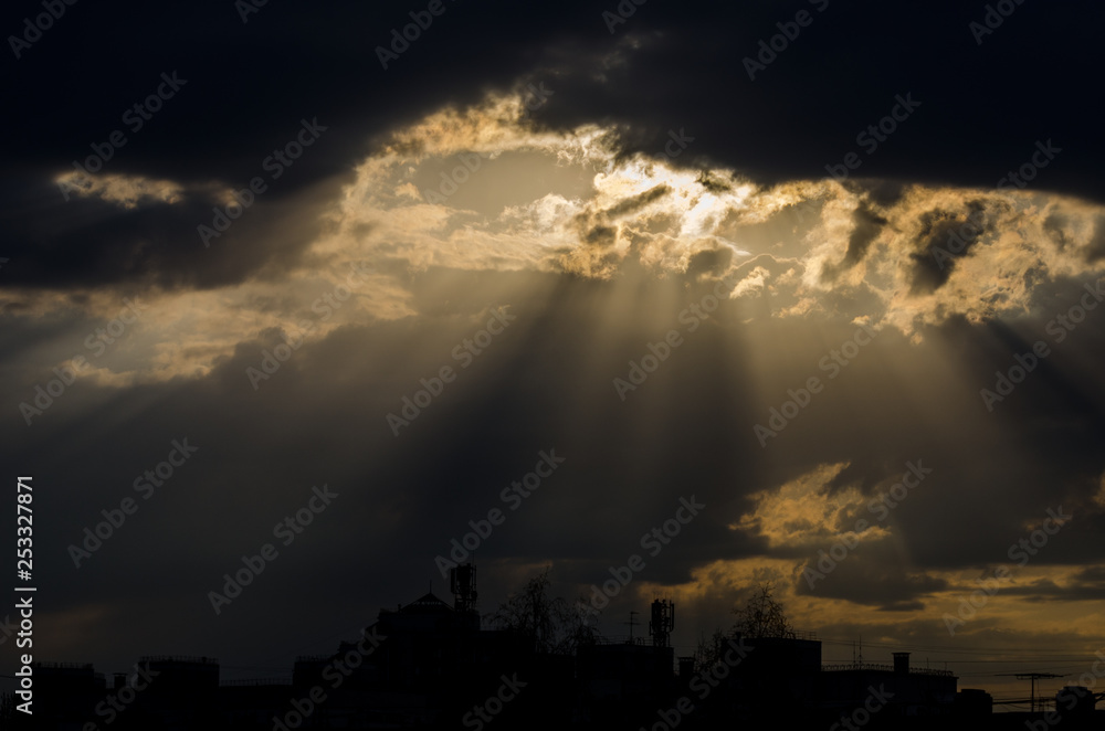 sunlight through the clouds