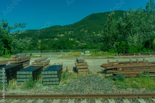 Italy La Spezia to Kasltelruth train  a wooden bench sitting in the grass