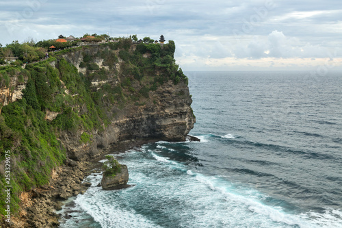 Balinese temple on the edge of the rock in Bali, Indonesia.