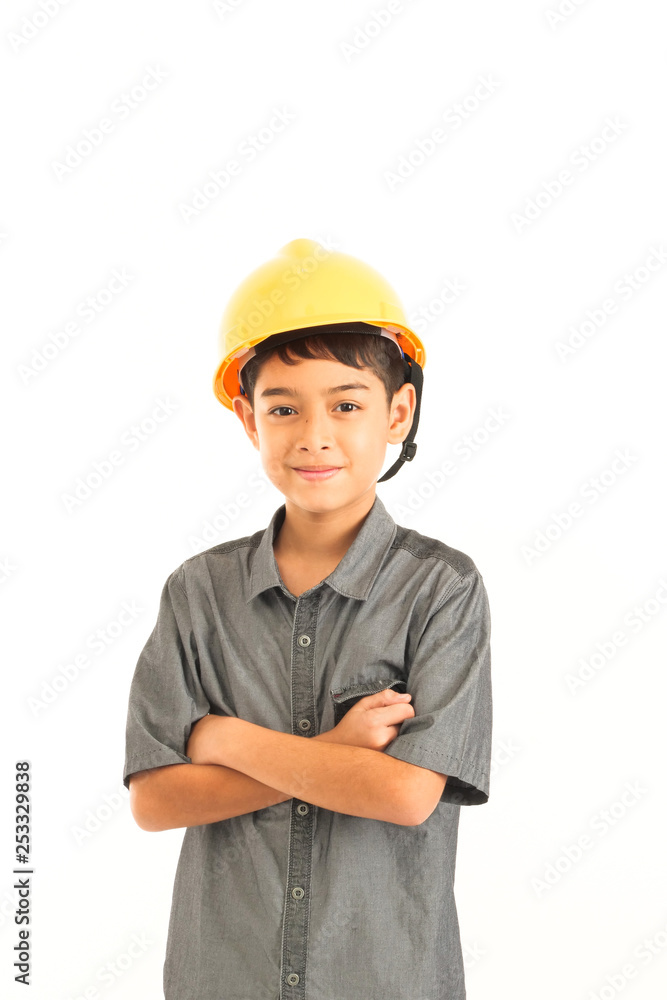Asian boy with engineer and safety yellow hat on white background Asian boy with engineer and safety yellow hat on white background