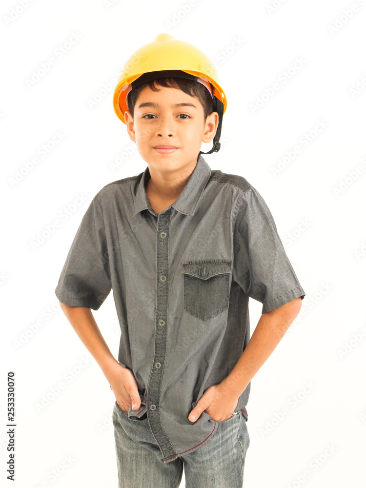 Asian boy with engineer and safety yellow hat on white background Asian boy with engineer and safety yellow hat on white background