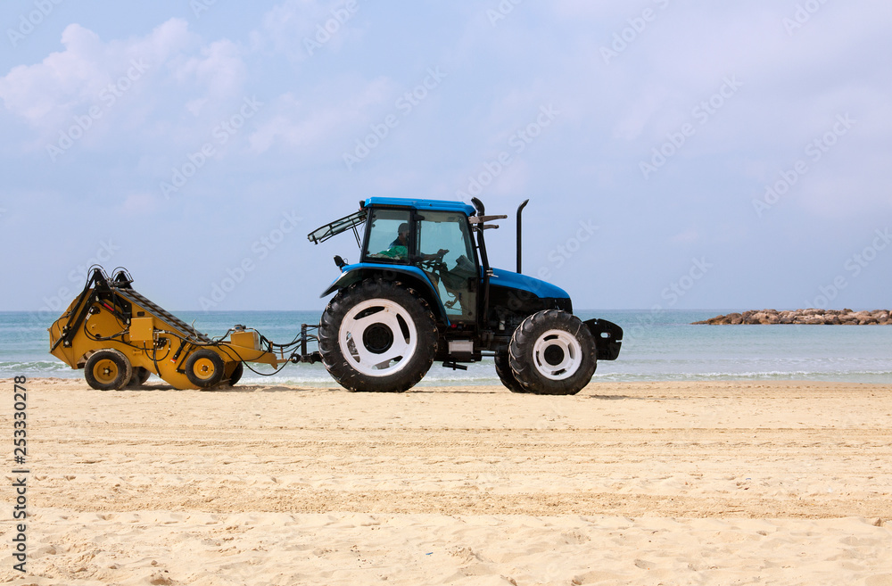 beach cleaning equipment cleans the sand on the beach beach cleaning equipment cleans the sand on the beach