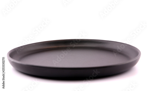 Top view of empty plate on white background.