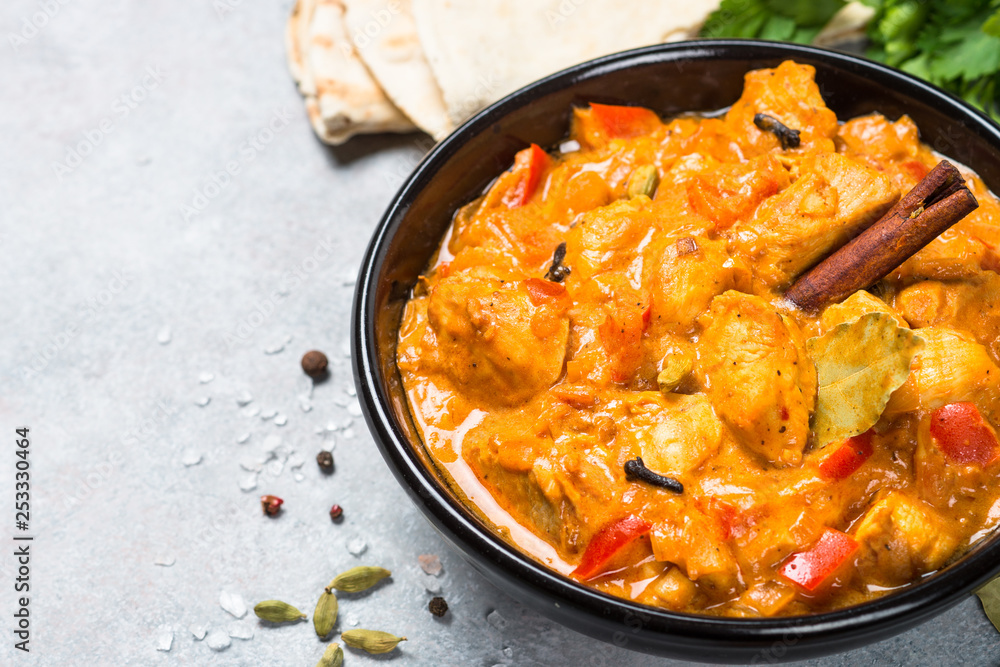 Chicken tikka masala with rice on black top view. Chicken tikka masala with rice on black top view.