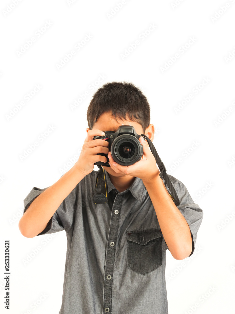 Asian boy with DSLR camera on white background Asian boy with DSLR camera on white background