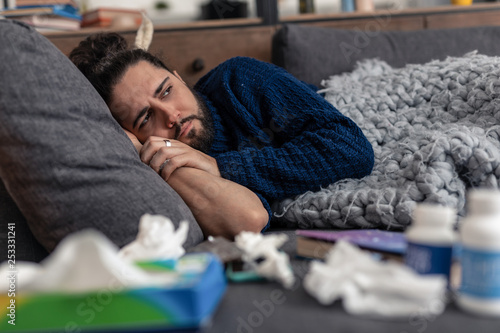 Картината върху платно Sad cheerless man thinking about his illness