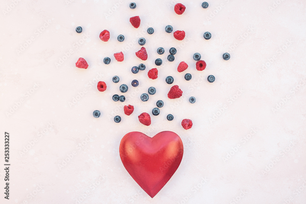 Valentine Day composition berries and red heart