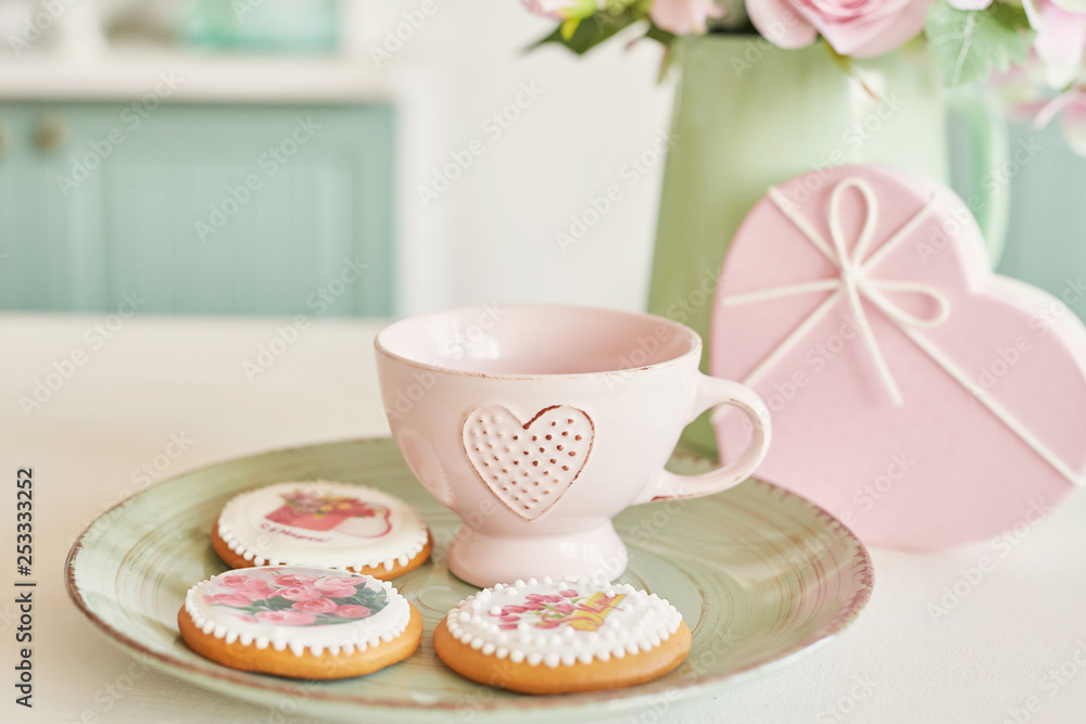 Gingerbreads for March 8 in the bright kitchen with flowers Gingerbreads for March 8 in the bright kitchen with flowers