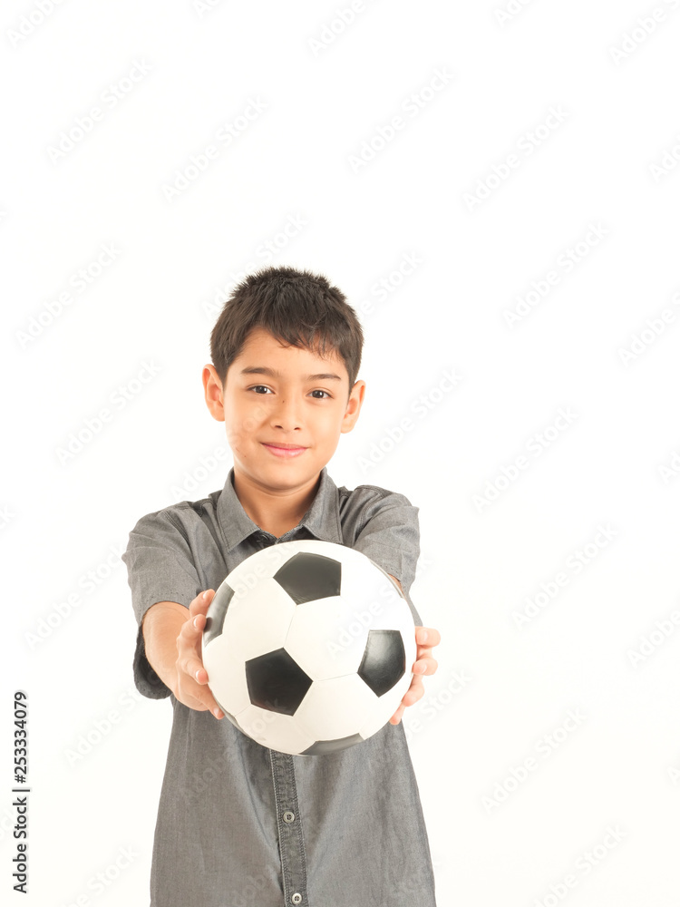 Asian boy with football on white background